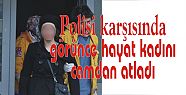 Polisi karşısında görünce hayat kadını camdan atladı